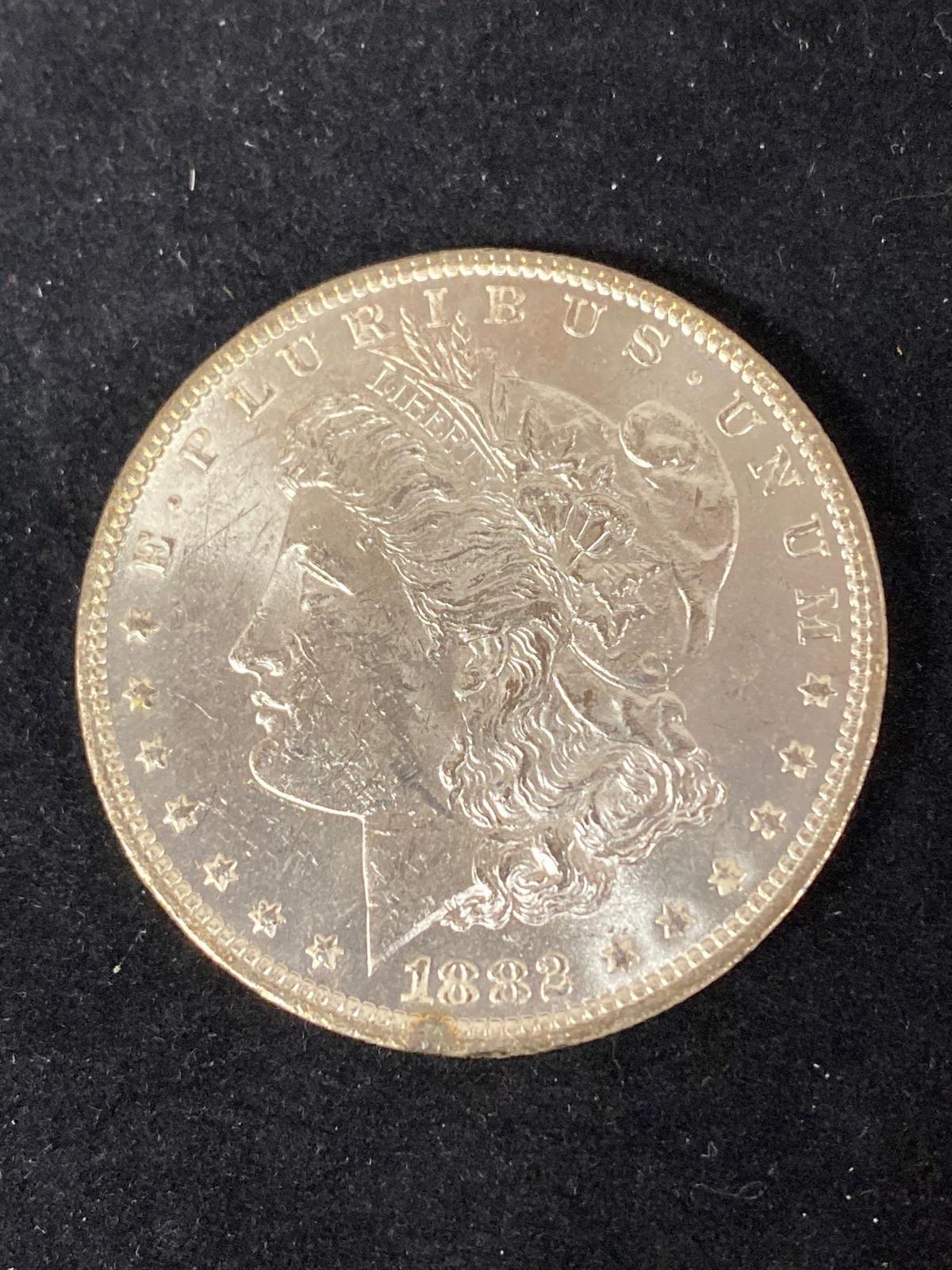 1882-O Morgan dollar, AU.