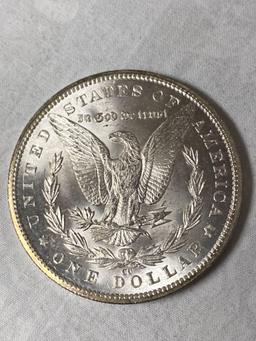 1885-CC Morgan dollar, AU.