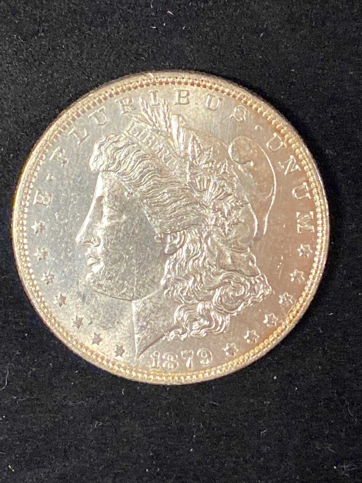 1879 Morgan dollar, AU.