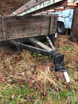 14' homemade tandem-axle trailer with ramps.