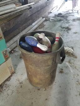 Trash can full of bowling pins