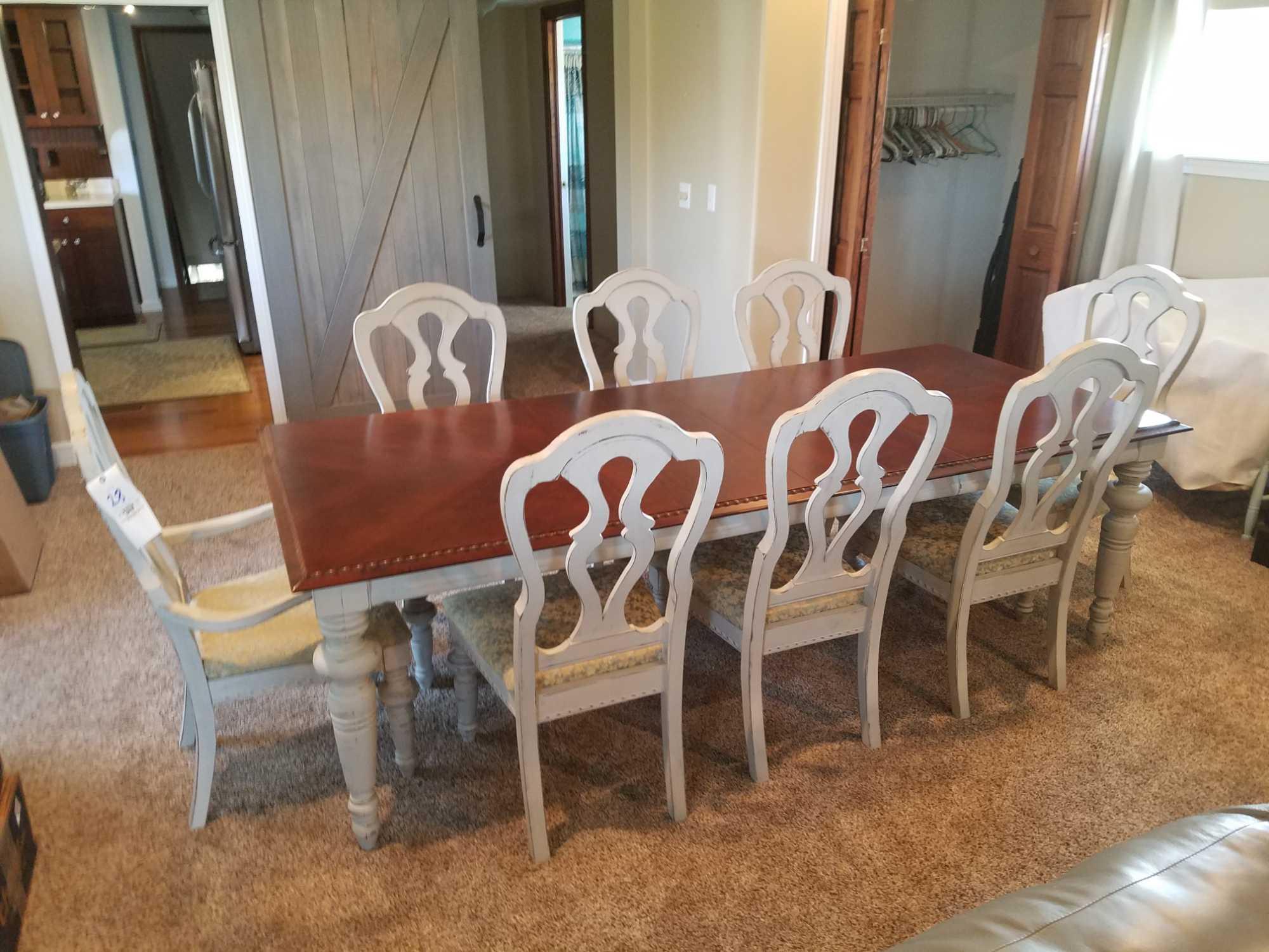 Broyhill dining room table with 8 chairs and 2 leaves