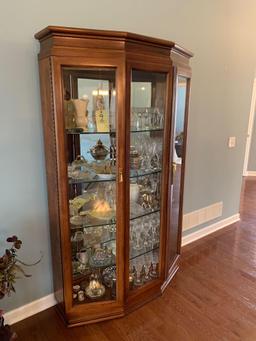 Beveled glass mirrored back curio cabinet