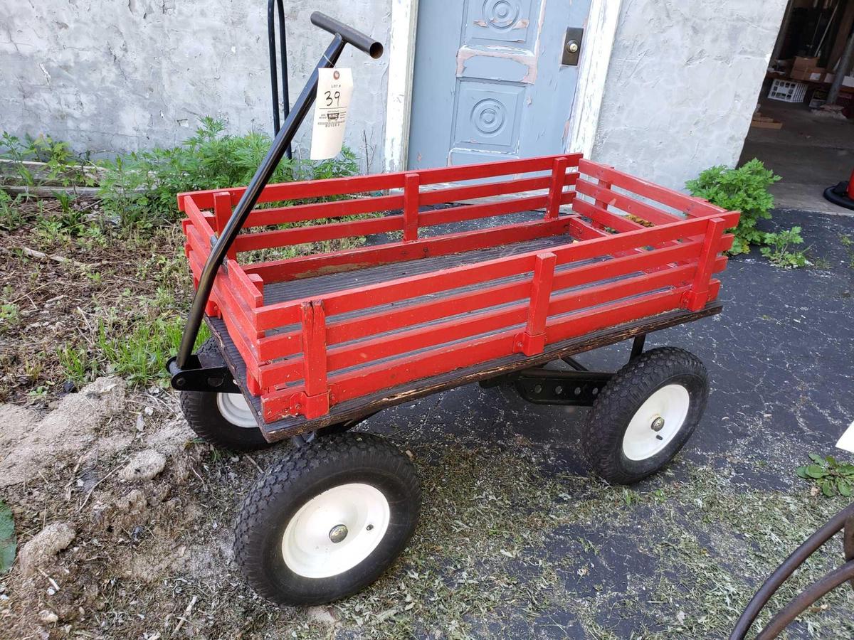 Red wagon on big wheels