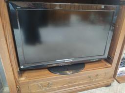 Entertainment Center w/ 32" Panasonic Tv, sony Cd Player, Sony Stereo, CDs and VHS Tapes, Decor