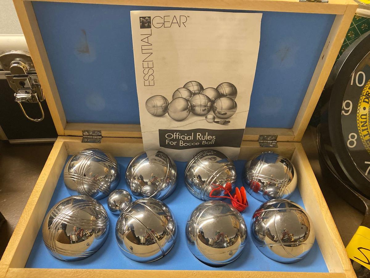 Silver style bocce ball in case