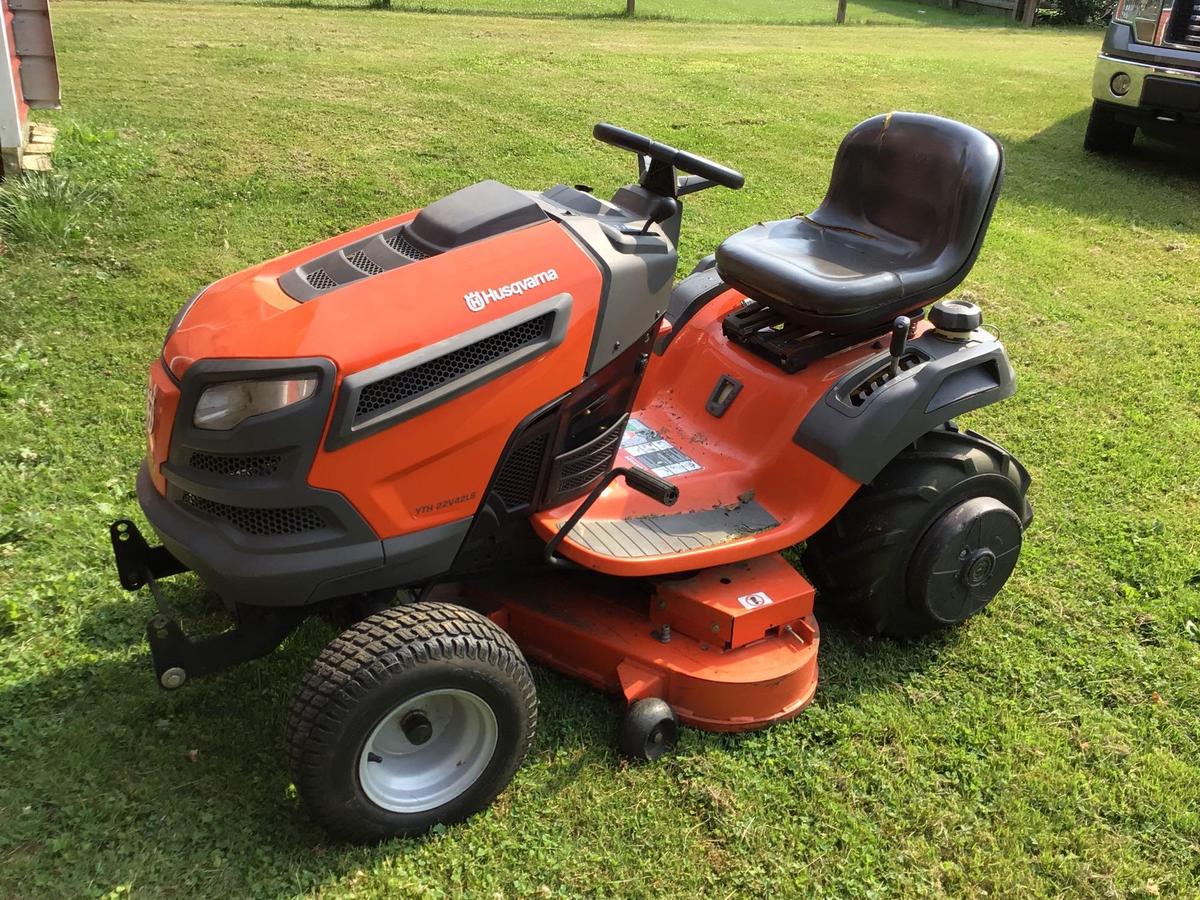 Husqvarna YTH 22V42LS riding mower with plow