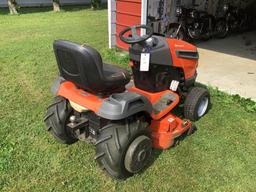 Husqvarna YTH 22V42LS riding mower with plow