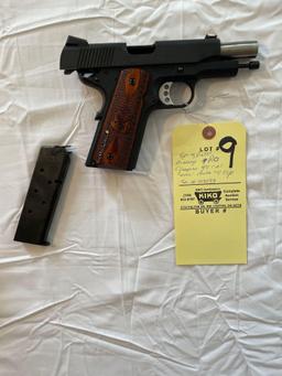 Springfield Champion .45-cal. handgun, with three mag