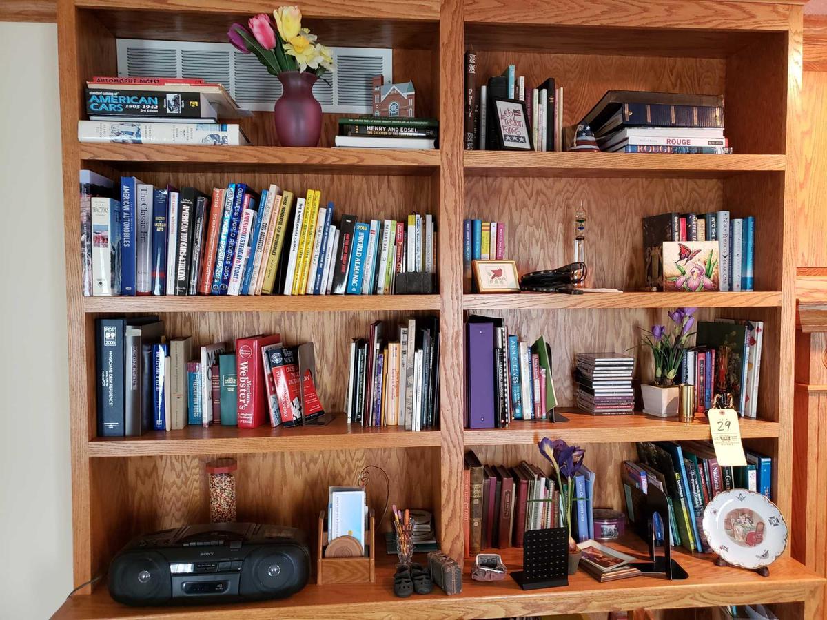 Shelf contents (includes books, radio, decor., CDs)