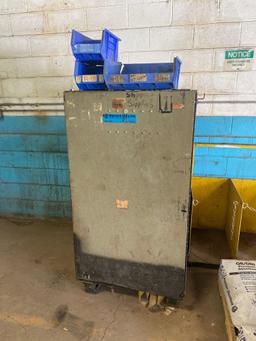 Metal mesh cabinet and contents, pipe cutter, impacts