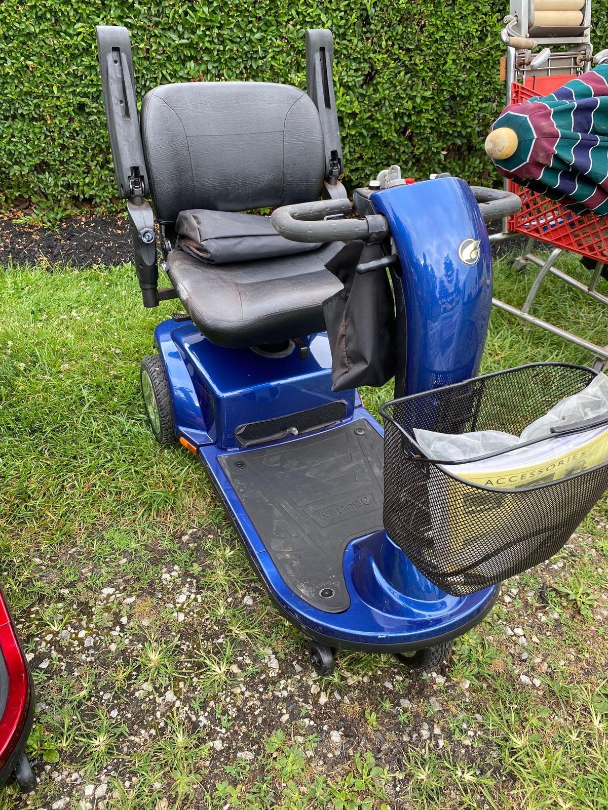 Golden Companion mobility scooter with charger and cover, works