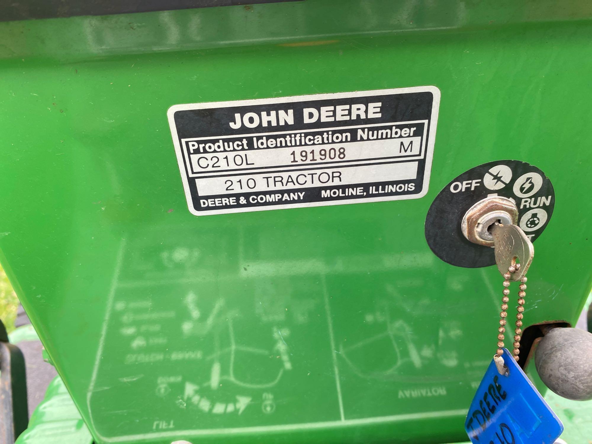 John Deere 210 Garden Tractor with snow blade, wheel weights, tire chains