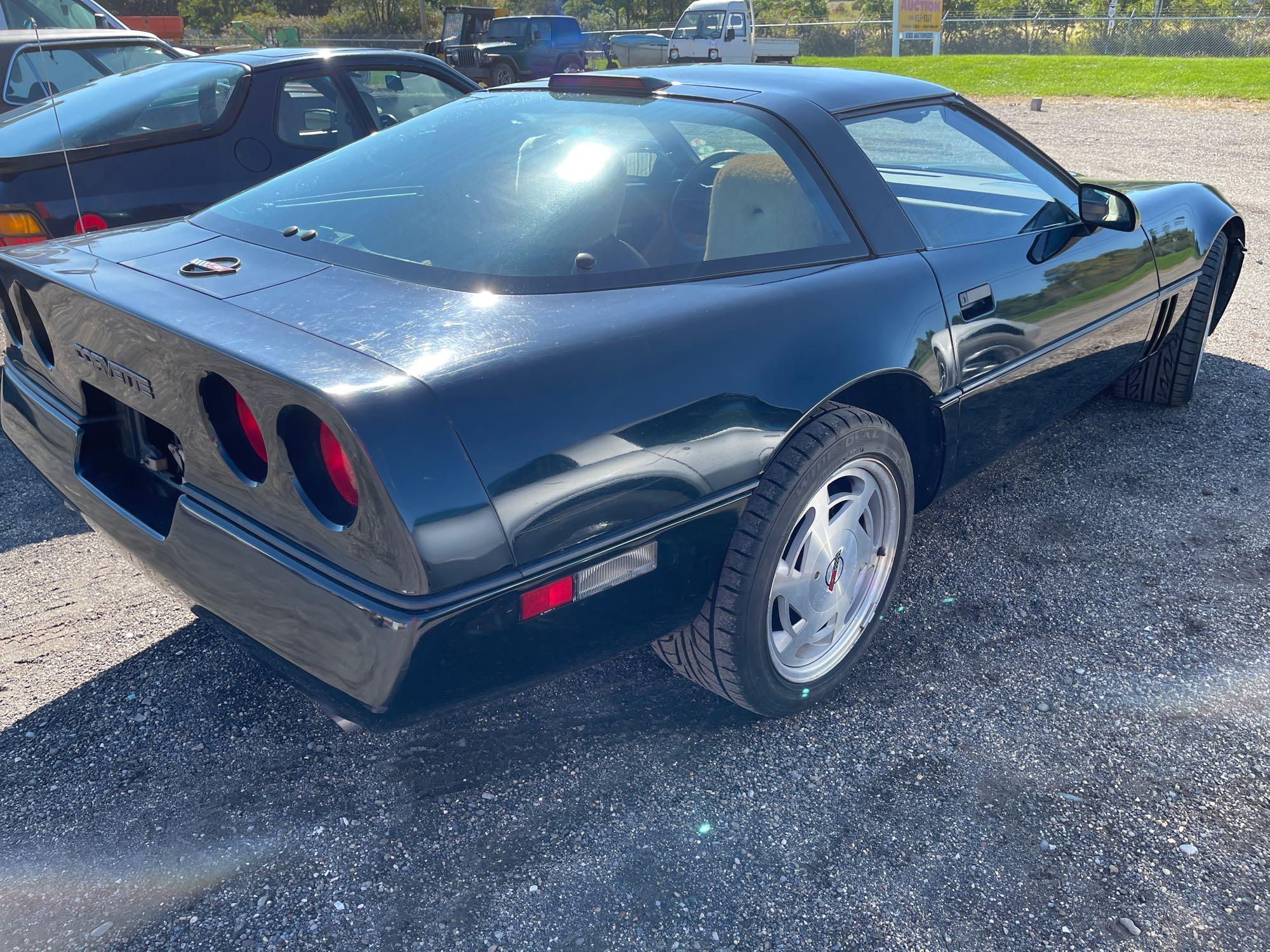 1989 black Corvette. 54,206 miles. Runs.