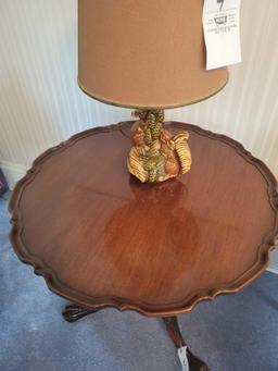 Pie crust top lamp table with carved base