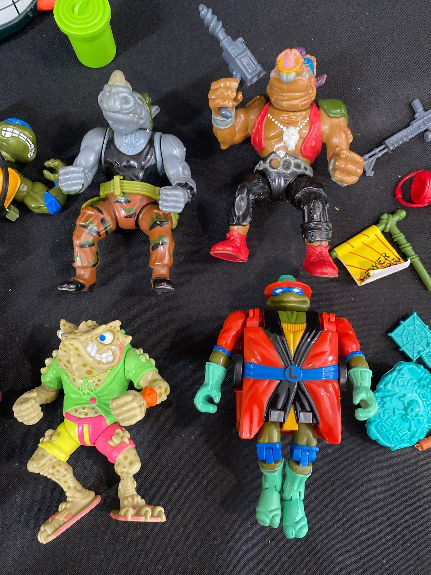 Vintage Teenage Mutant Ninja Turtles Action Figures, Vehicles, Weapons