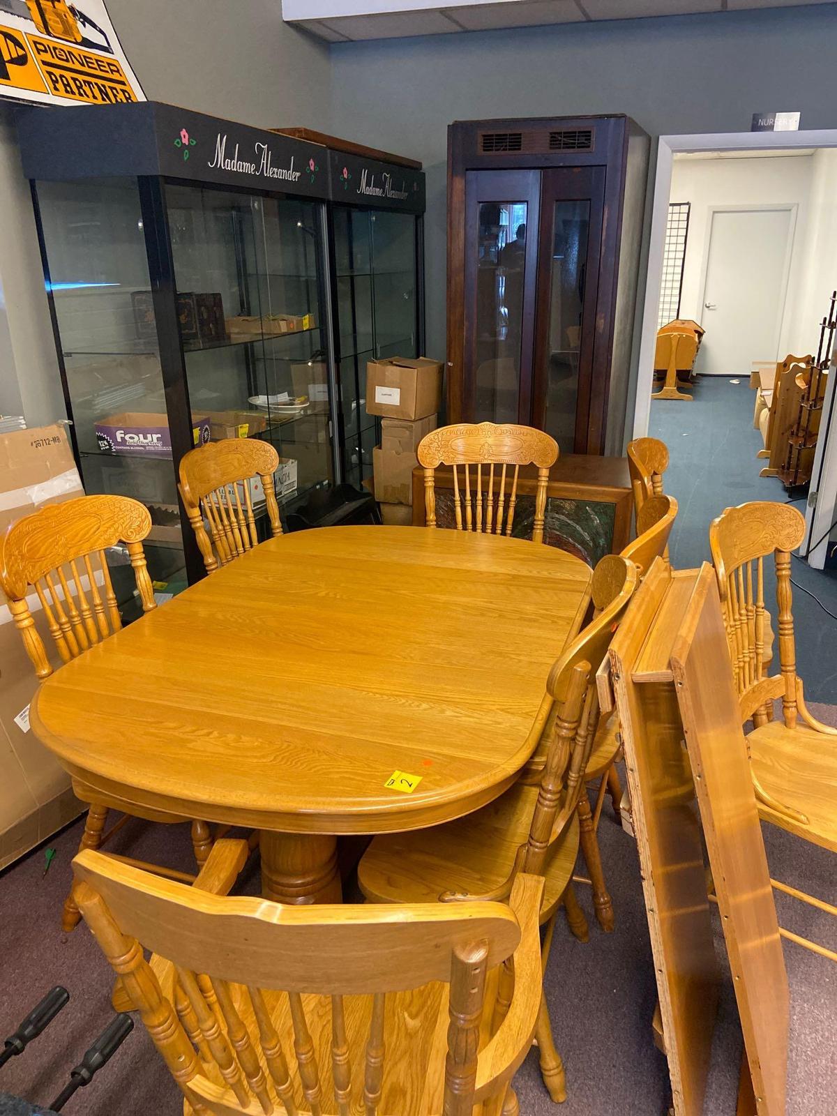 Large oak dining room table with 8 chairs, 2 leaves, solid oak press back chair