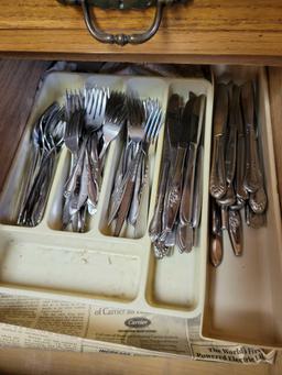 Contents of kitchen cupboards below countertop