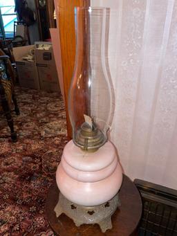 Scovill oil lamp with small metal framed stand, 20 inches tall