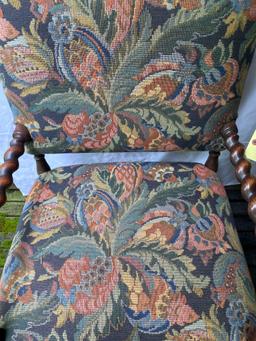 Antique Tudor style arm chair w/ mermaid carved girl & boy on arms, 38" tall.