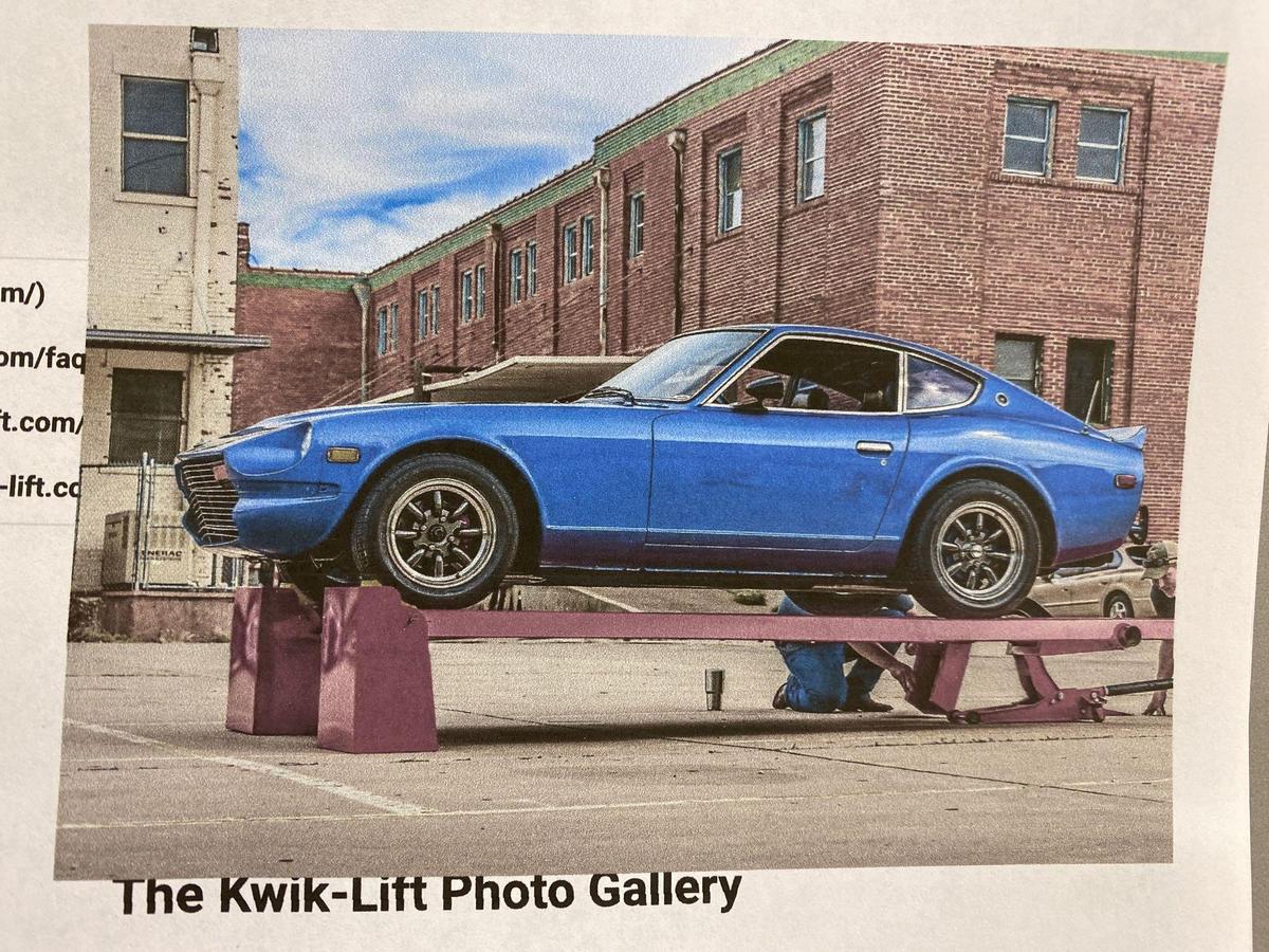 Kwik-Lift w/ owner made custom accessories, 5,000 lb. capacity. Car in picture not included.