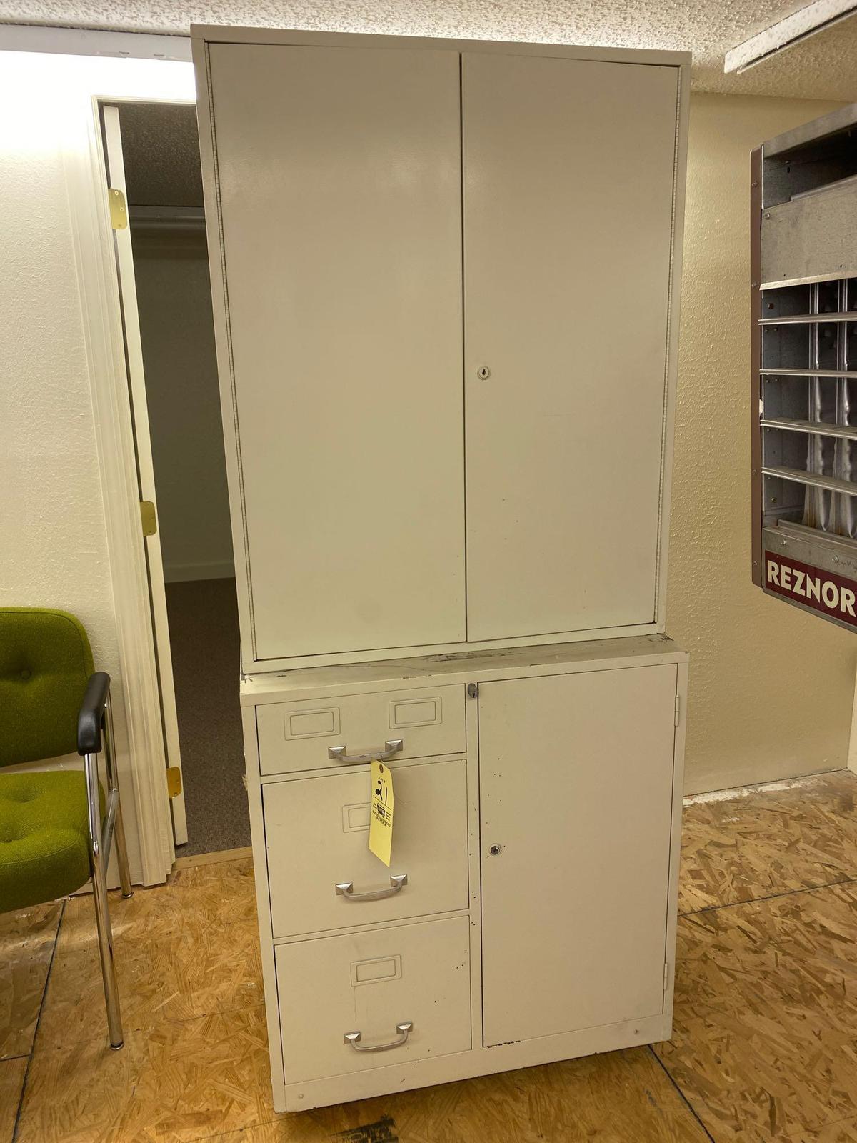 2-Pc. Metal cabinet, 72" tall x 30.5" wide, on wheels.