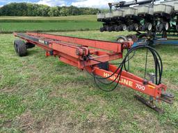 Self unloading highline 700 round bale wagon w/ hyd. Web chain