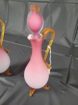 Pair of peach blow footed decanters with applied decor