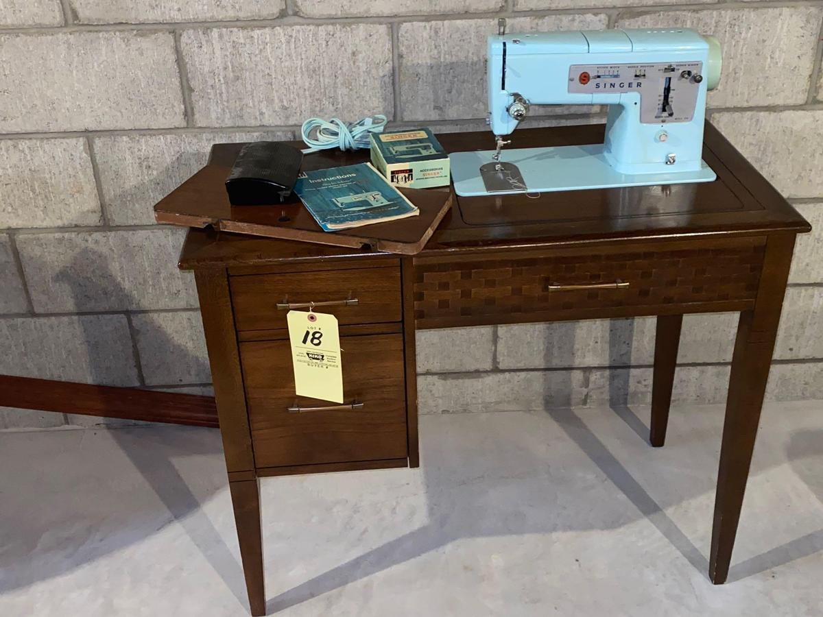 Singer Style Mate model 348 zig zag sewing machine W/ cabinet, instruction book.