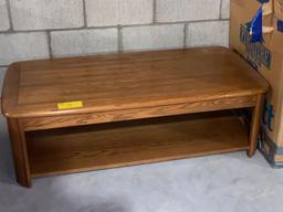 Modern oak coffee table, 50" long x 25".