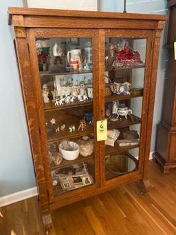 Oak Empire style China cabinet, 62" tall x 39.5" wide.