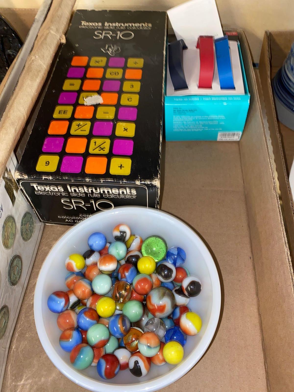 Texas instruments calculator, marbles