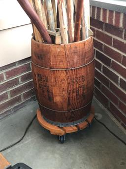 25+ walking sticks in nail keg stand