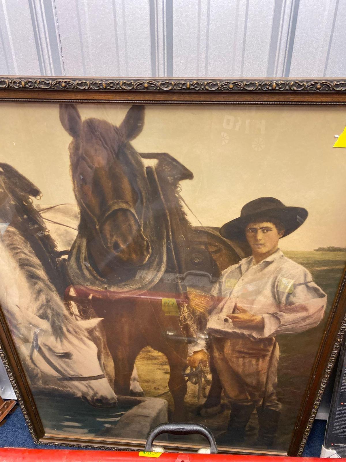 Old framed print with horses and young men