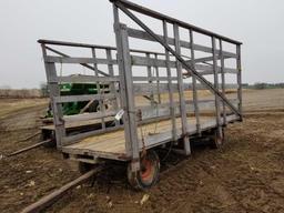 Wood sided kicker bale wagon