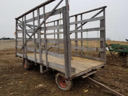 Wood sided kicker bale wagon