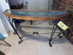 Beveled glass-top console stand, 54" wide.