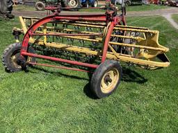 New Holland 258 roll bar rake with dolly wheel