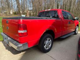 2004 Ford F-150 XLT Triton pickup truck, (125,546 miles), has rust around rear wheel wells.