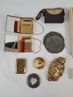 Antique purses, compacts, and dresser accessories