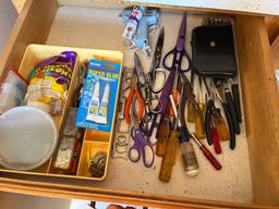 contents of lower kitchen cabinets and drawers, pans, baking items and more