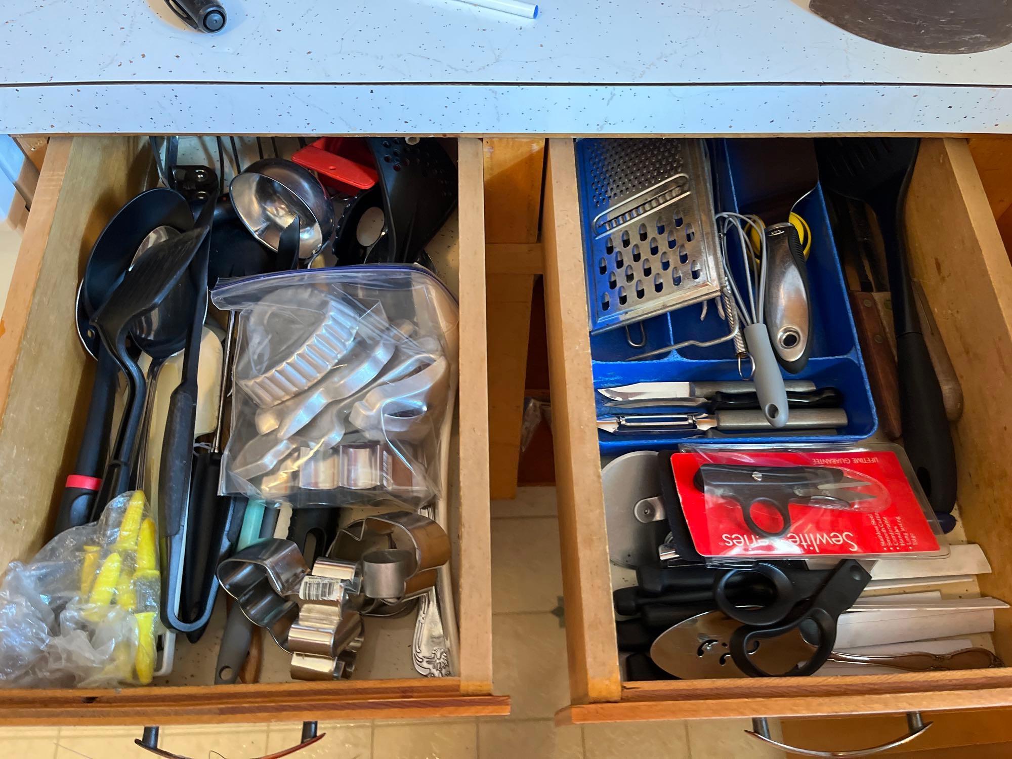 contents of lower kitchen cabinets and drawers, pans, baking items and more