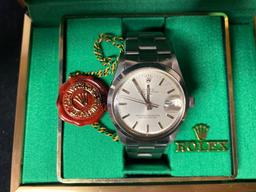 Rolex Oyster Perpetual stainless steel watch.