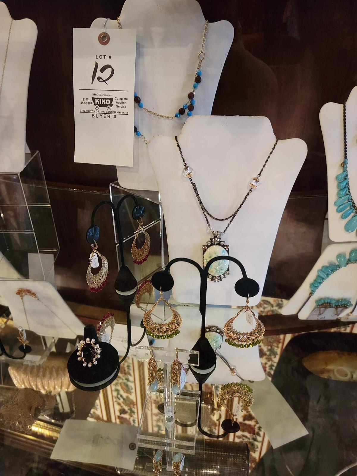 Costume jewelry necklace earring sets, ring, and displays