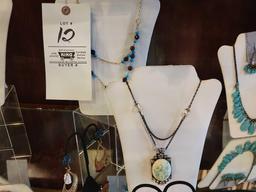 Costume jewelry necklace earring sets, ring, and displays