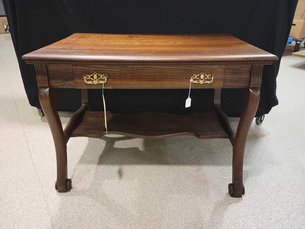 Clean Oak library table with applied carvings, 38inches wide