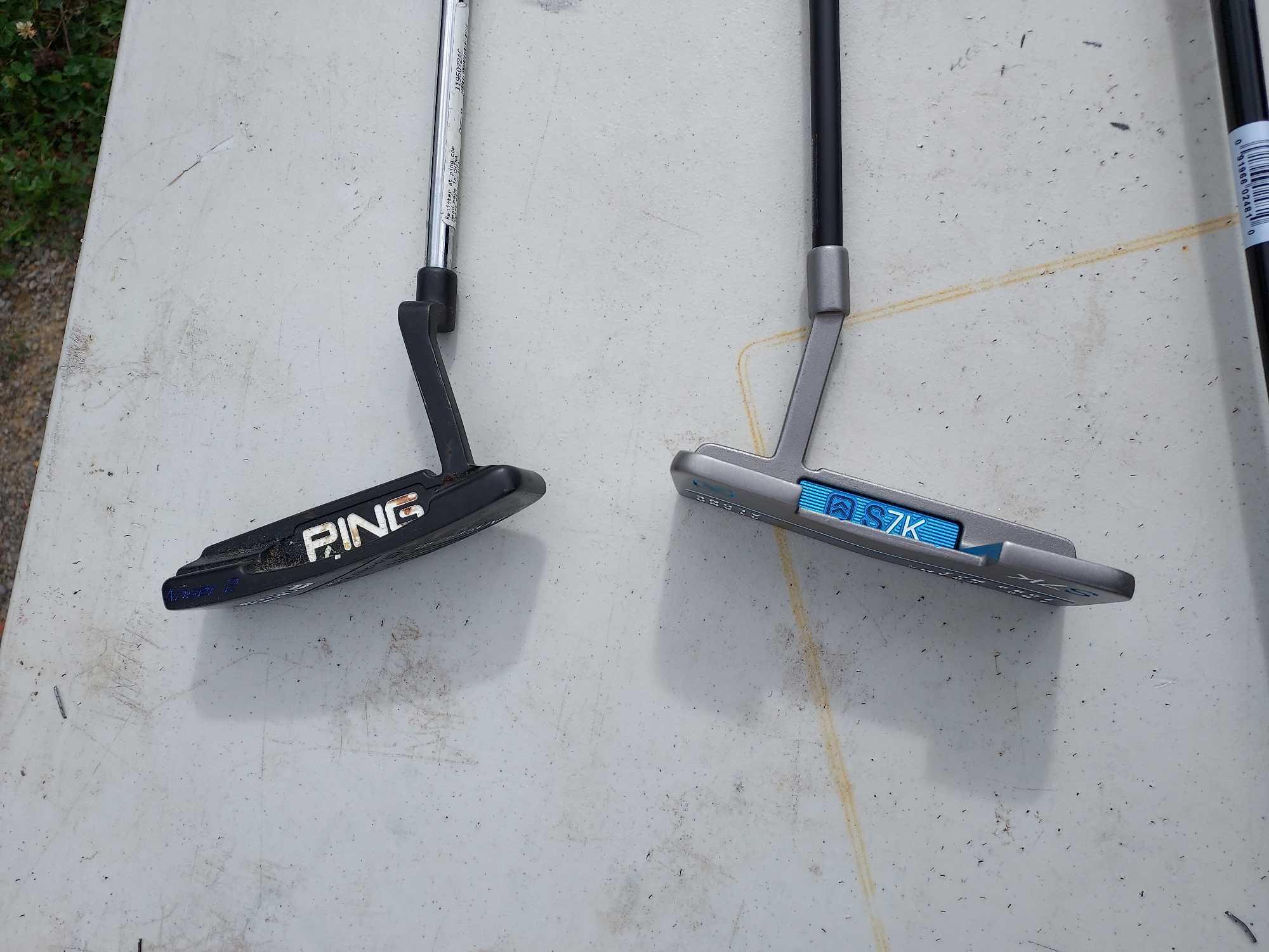 5 Golf Clubs: 2 Putters, 2 Drivers, 1 V-Line