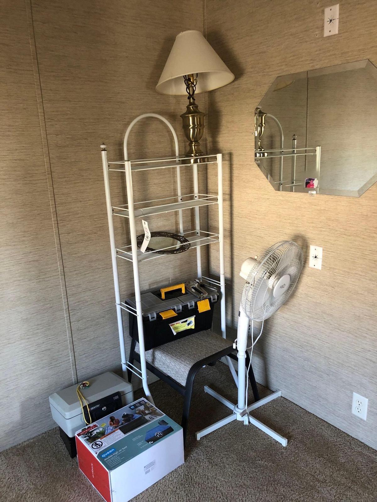 bathroom shelf, fan, lock boxes and toolbox