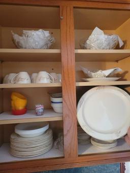 Contents of kitchen cupboards, china set, utensils, canisters, small dog dish, cleaners