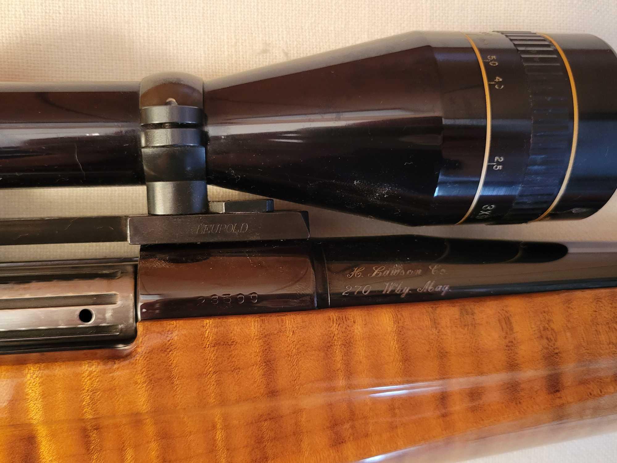 Weatherby mark 270 wby. mag. bolt action rifle with 3-9 leupold scope and hard case